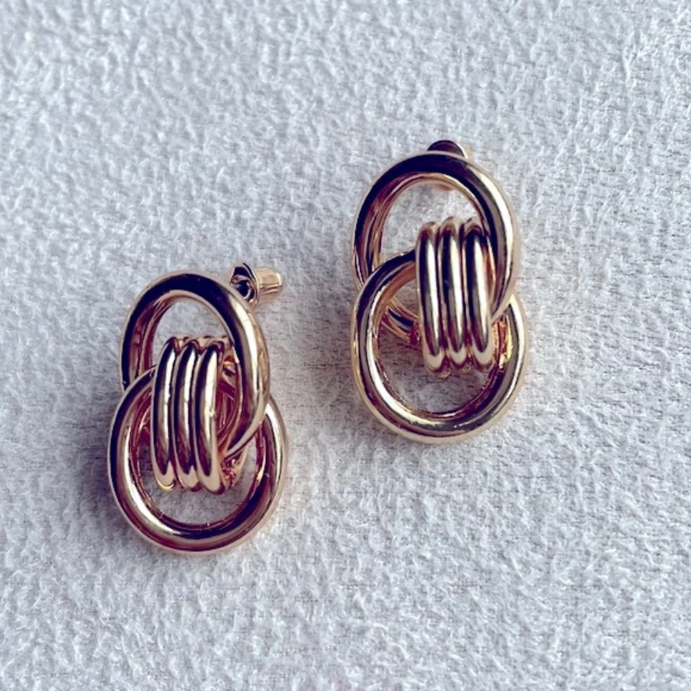 Gold double knot stud earrings